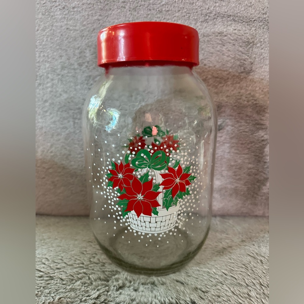 Vintage Carlton 3L glass Christmas themed jar. Poinsettias in woven basket.